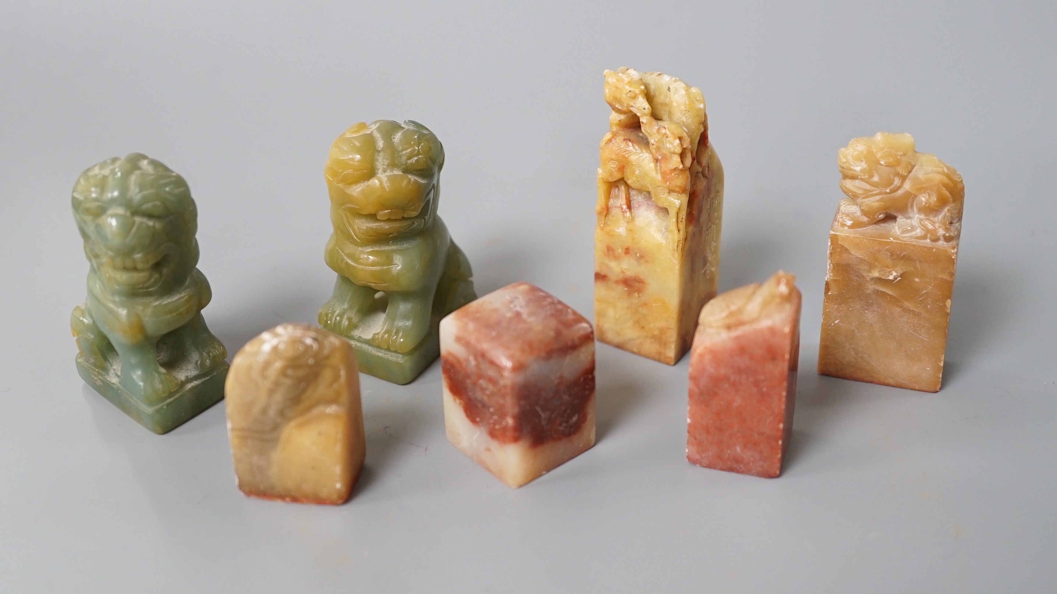 A selection of five Chinese mixed stone seals together with a pair of small jadeite dog figures (7), largest 5.5cm